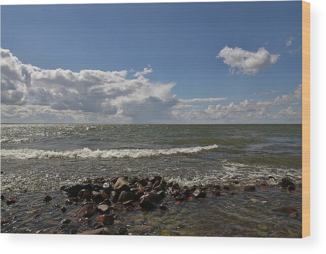 Sweden Wood Print featuring the pyrography Clouds over sea by Magnus Haellquist