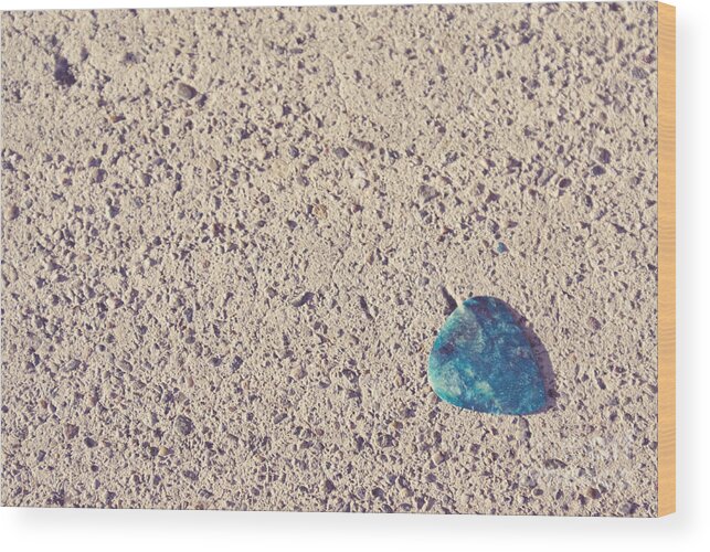 Guitar Pick Wood Print featuring the photograph Guitar pick on sidewalk by Cindy Garber Iverson