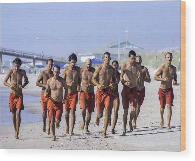  Life Guard Wood Print featuring the photograph Kure Beach Life guards on the run by WAZgriffin Digital