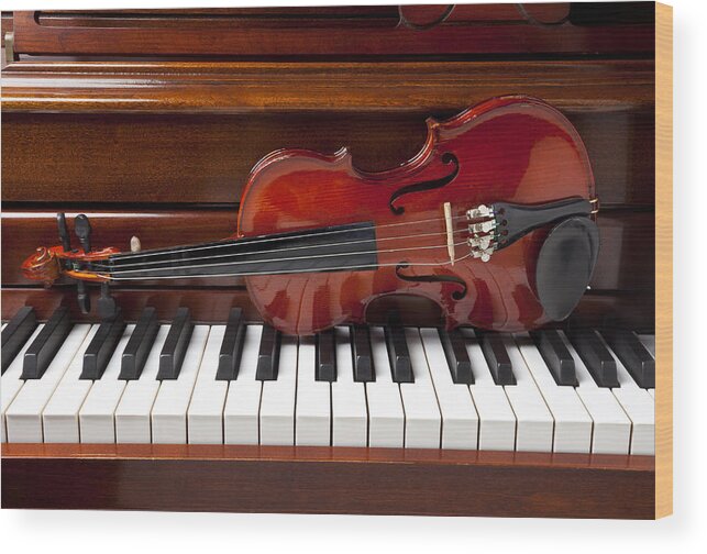 Violin Wood Print featuring the photograph Violin on piano by Garry Gay