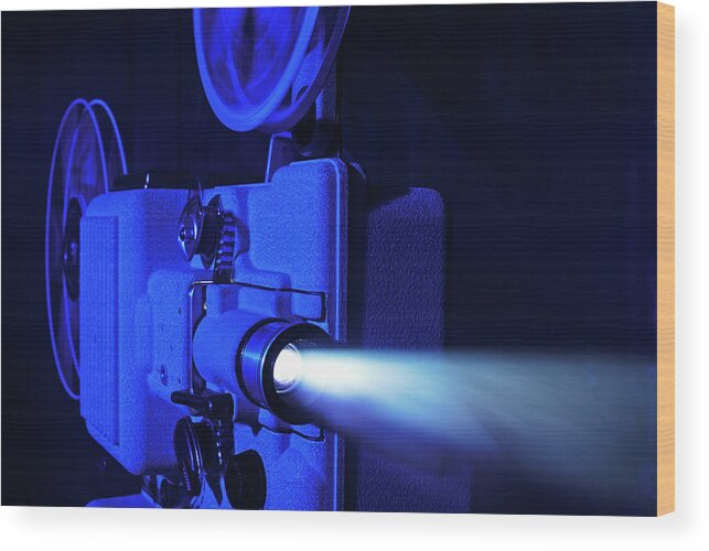 Camera Film Wood Print featuring the photograph 8mm Film Projector Running #1 by David Gould