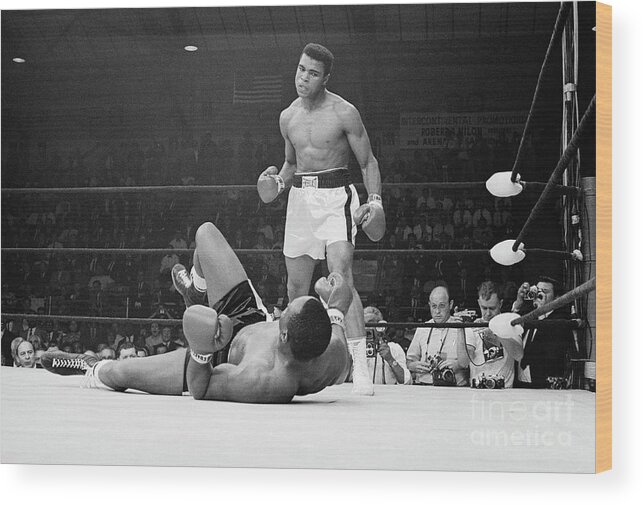 People Wood Print featuring the photograph Boxers Muhammad Ali And Sonny Liston by Bettmann