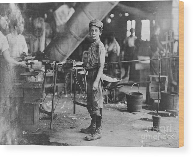 Working Wood Print featuring the photograph Boy Working In Glass Factory by Bettmann
