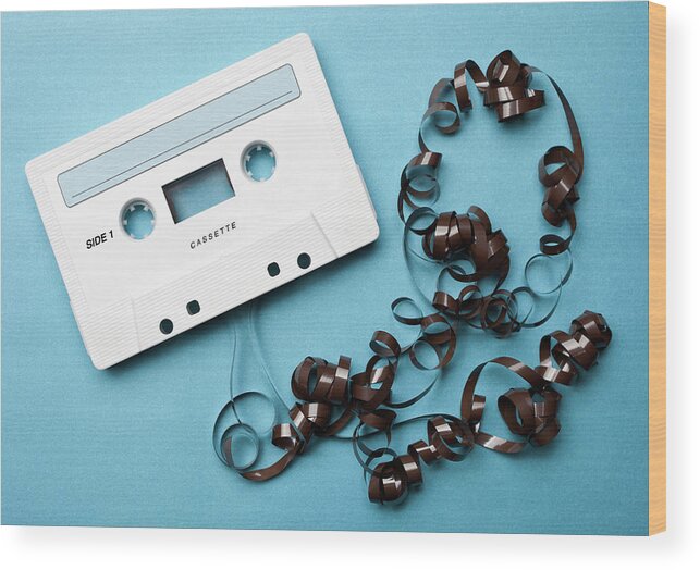 Information Medium Wood Print featuring the photograph Cassette With Tangled Recording Tape by William Andrew