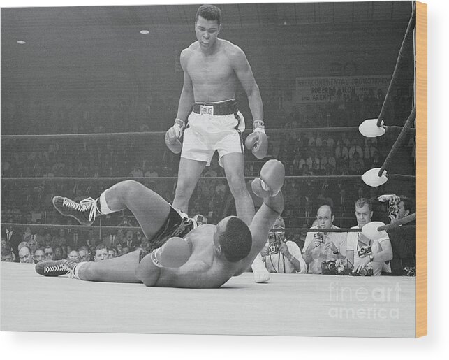 People Wood Print featuring the photograph Cassius Clay And Sonny Liston by Bettmann