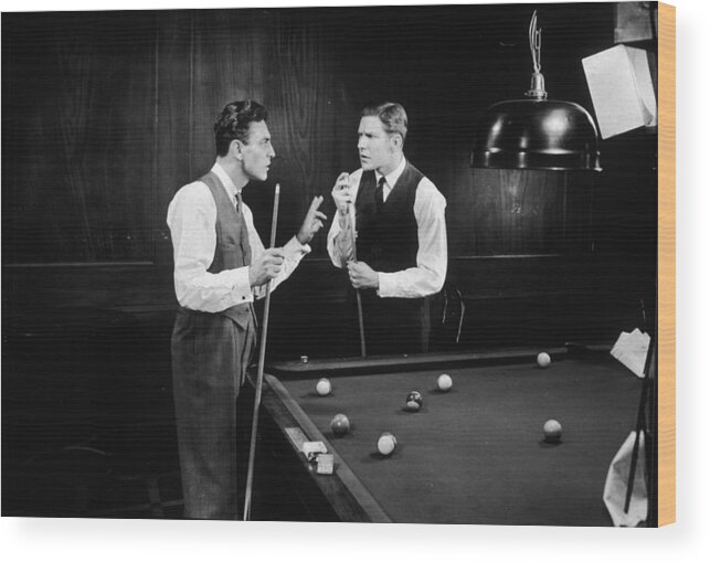 1940-1949 Wood Print featuring the photograph Cue Debate by Hulton Archive