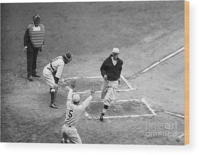 St. Louis Cardinals Wood Print featuring the photograph Dizzy Dean Crossing Home Plate by Bettmann