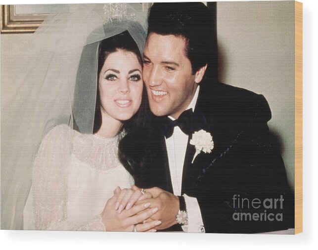 Following Wood Print featuring the photograph Elvis Presley Smiling With Bride by Bettmann
