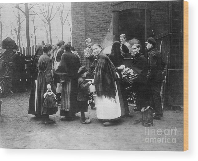 People Wood Print featuring the photograph Germans Receiving Food From French Soup by Bettmann