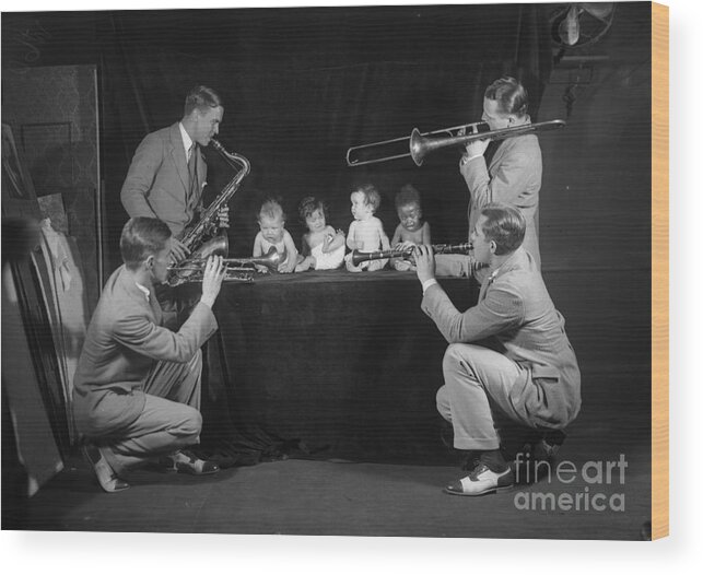 Artist Wood Print featuring the photograph Jazz Band Playing To Babies 6-11 Months by Bettmann