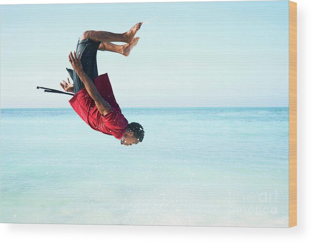 Expertise Wood Print featuring the photograph Man Doing Backflip In Sea by Tara Moore