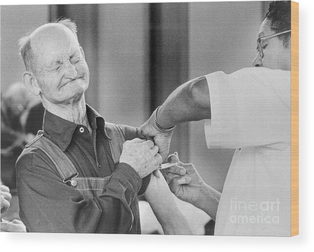 People Wood Print featuring the photograph Man Receiving Flu Shot by Bettmann