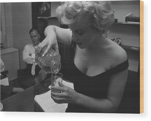 New York City Wood Print featuring the photograph Monroe Pouring a Drink by Robert Kelley