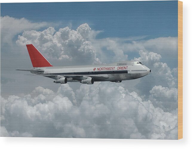 Northwest Orient Airlines Wood Print featuring the mixed media Northwest Orient Among the Clouds by Erik Simonsen