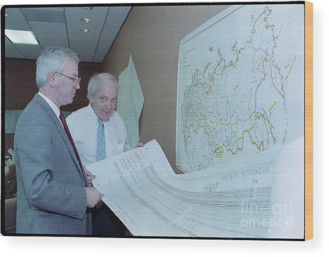 People Wood Print featuring the photograph Officials Reviewing Geological Charts by Bettmann