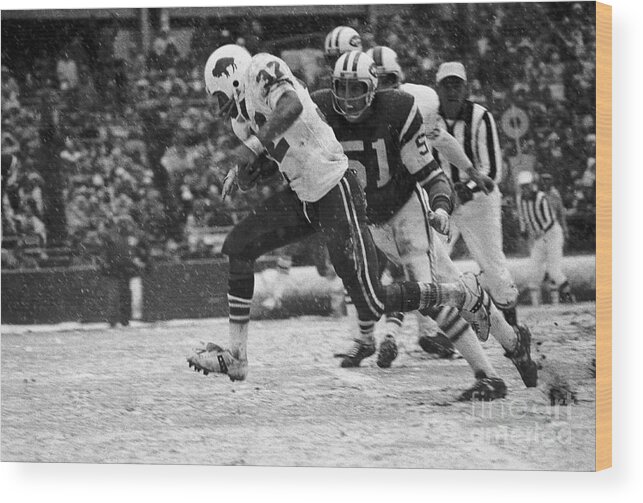 People Wood Print featuring the photograph O.j. Simpson Slipping Past The Jets by Bettmann