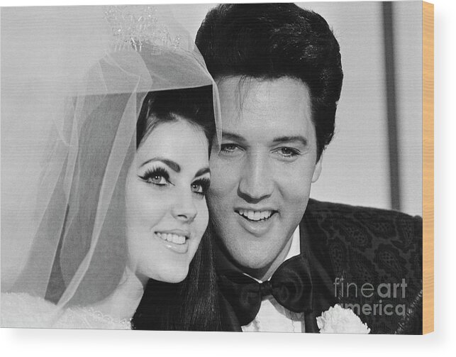 Rock Music Wood Print featuring the photograph Pricilla And Elvis Presley by Bettmann