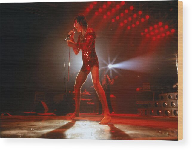 Freddie Mercury Wood Print featuring the photograph Queen Concert by Michael Ochs Archives