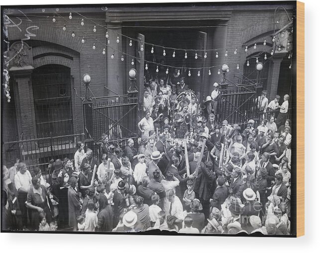 Crowd Of People Wood Print featuring the photograph Saints Statue Leaving Church For Parade by Bettmann