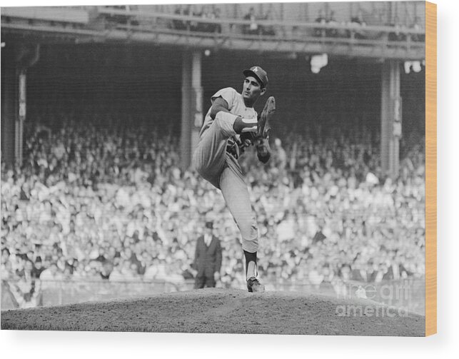 Sandy Koufax Wood Print featuring the photograph Sandy Koufax Throwing Pitch In World by Bettmann