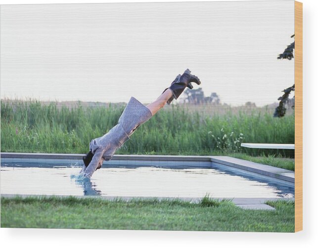 #new2022vogue Wood Print featuring the photograph Stella Tennant Diving Into A Pool by Arthur Elgort