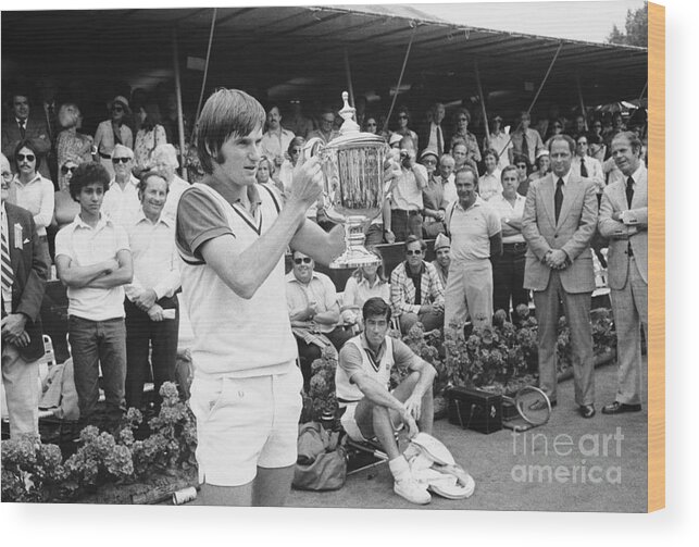 Tennis Wood Print featuring the photograph Tennis Champion Jimmy Connors Holds by Bettmann