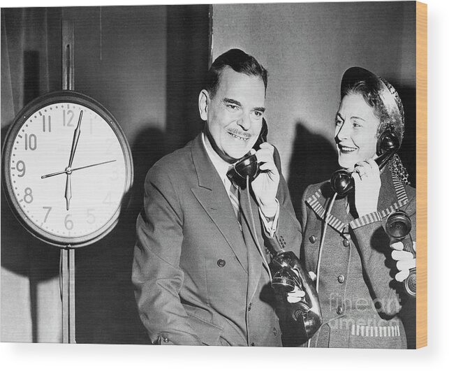Polling Place Wood Print featuring the photograph Thomas Dewey And Wife Talking by Bettmann
