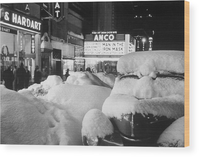 1940-1949 Wood Print featuring the photograph Times Square in Snow by Andreas Feininger