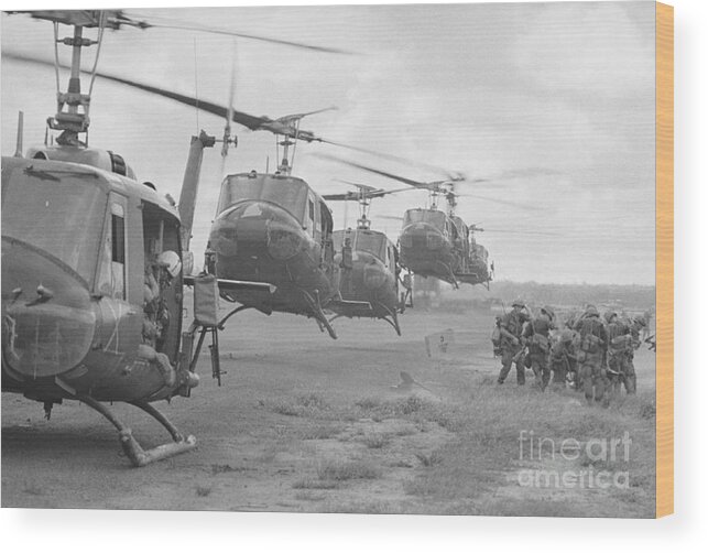 Vietnam War Wood Print featuring the photograph Us Helicopters Taking by Bettmann