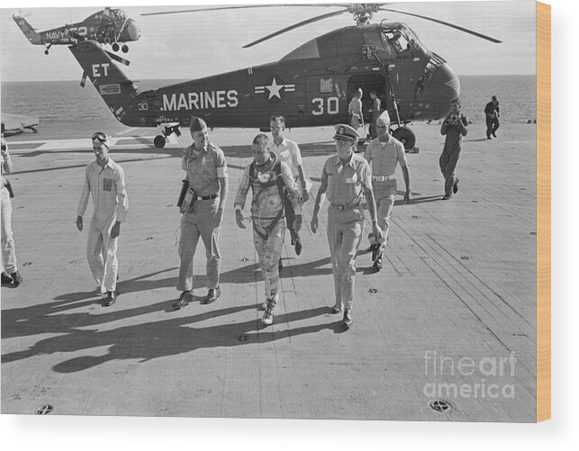 Helicopter Crash Wood Print featuring the photograph Virgil Grissom Walks From Helicopter by Bettmann