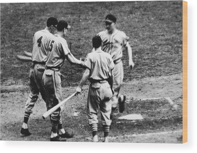 St. Louis Cardinals Wood Print featuring the photograph Whitey Kurowski Comes Home by Hulton Archive