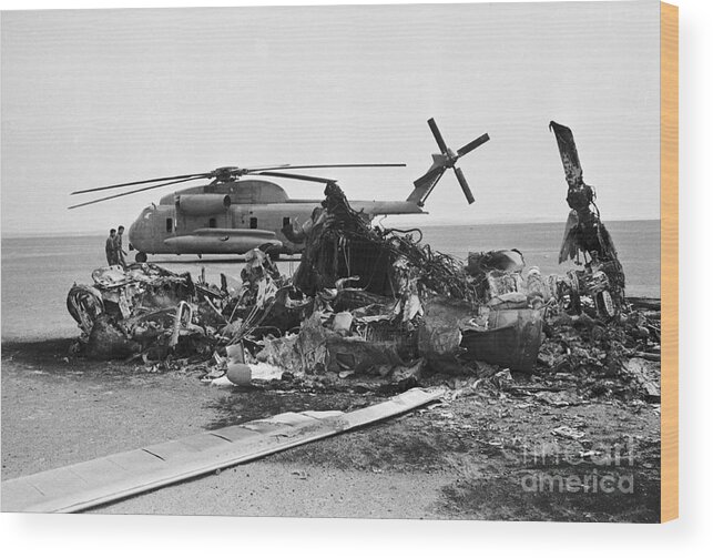 1980-1989 Wood Print featuring the photograph Wreckage Of American Helicopters by Bettmann