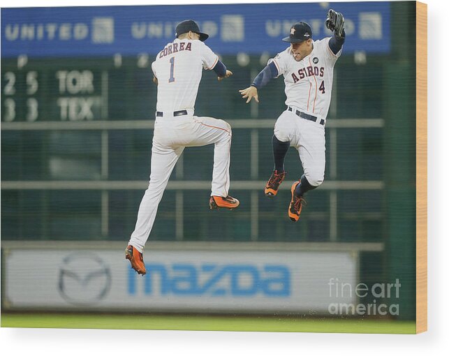 American League Baseball Wood Print featuring the photograph George Springer and Carlos Correa by Bob Levey
