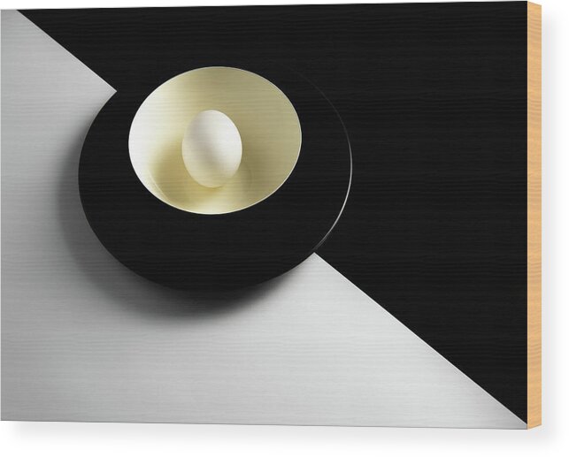 Still-life Wood Print featuring the photograph Single fresh white egg on a yellow bowl by Michalakis Ppalis