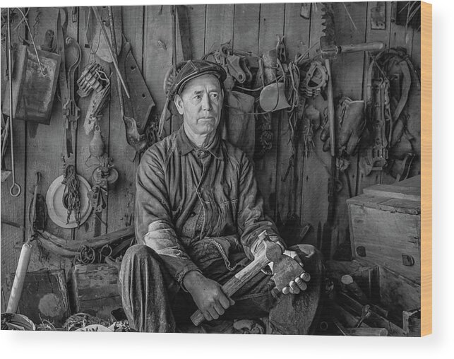 1937 Wood Print featuring the photograph A farmer in his toolhouse by David Letts