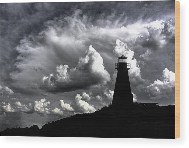At Peters Lighthouse Silhouette Sea Sky Light Nova Scotia Canada Long Island Brier Island Wood Print featuring the photograph Against the Light by David Matthews