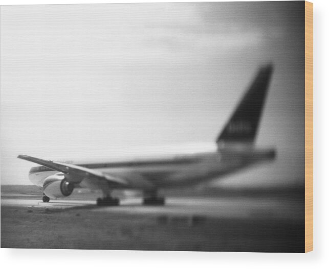 Outdoors Wood Print featuring the photograph Airplane, b&w. by Frederic Cirou