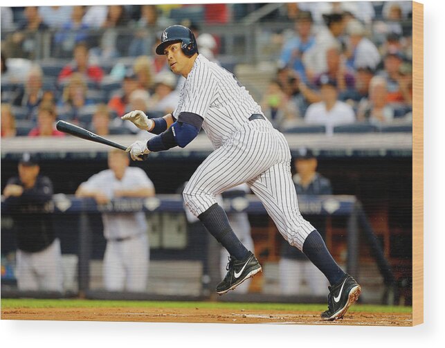 Following Wood Print featuring the photograph Alex Rodriguez by Jim Mcisaac