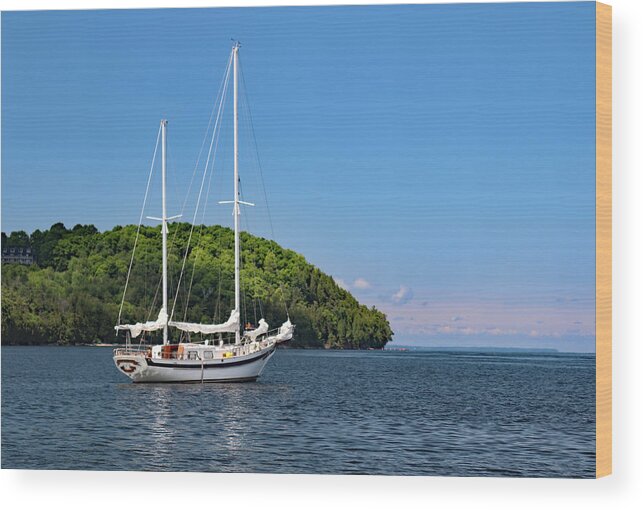 Sailboat Wood Print featuring the photograph Anchored in Sister Bay by David T Wilkinson