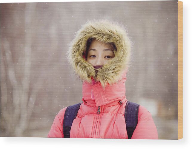 Beautiful Woman Wood Print featuring the photograph Asian girl in snowing day by Lawren