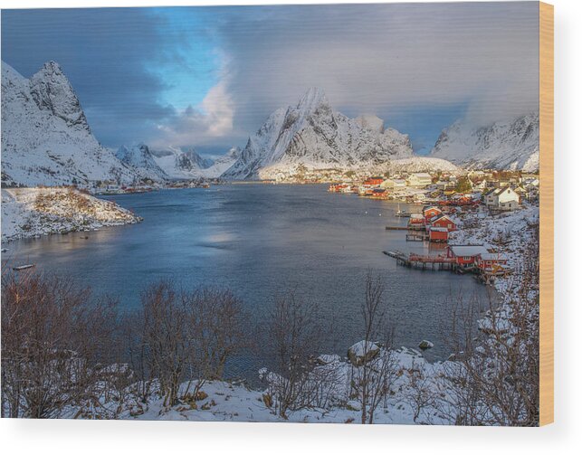 Blue Hour Wood Print featuring the photograph Blue hour over Reine by Dubi Roman