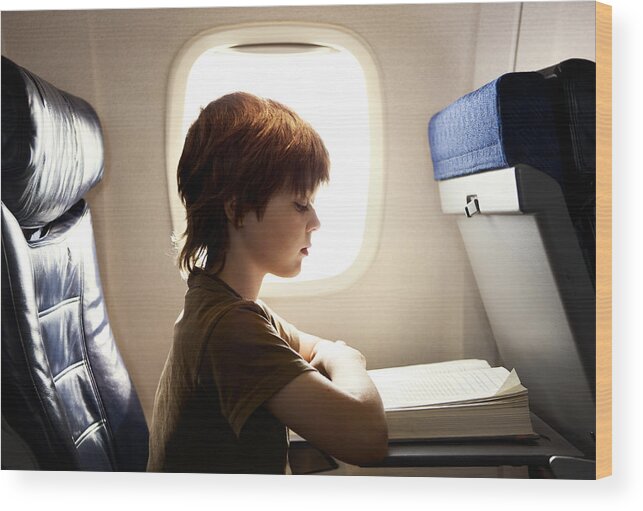 Outdoors Wood Print featuring the photograph Boy Reading On A Plane by Blaise Hayward