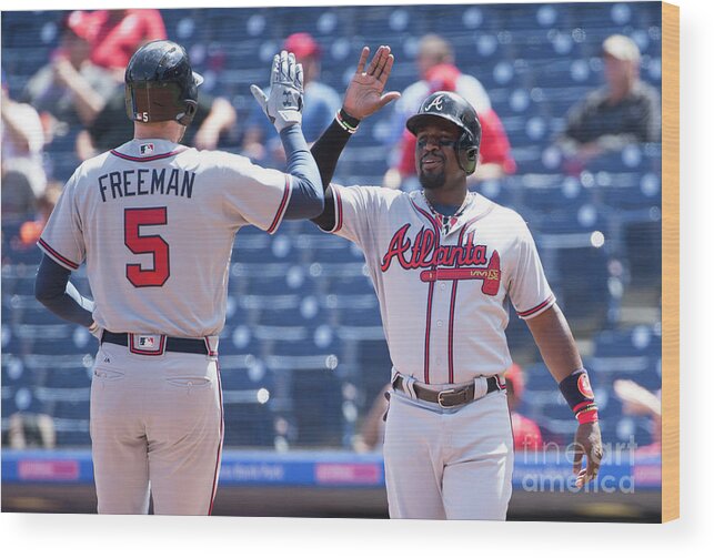Three Quarter Length Wood Print featuring the photograph Freddie Freeman and Brandon Phillips by Mitchell Leff