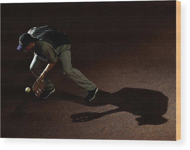 Ball Wood Print featuring the photograph Justin Morneau by Christian Petersen