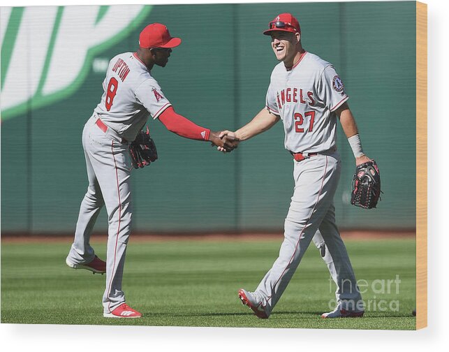 American League Baseball Wood Print featuring the photograph Justin Upton and Mike Trout by Thearon W. Henderson
