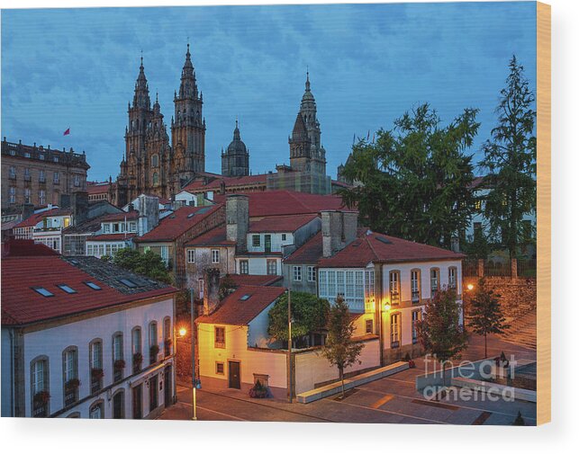Way Wood Print featuring the photograph Santiago de Compostela Cathedral Spectacular View by Night Dusk with Street Lights and Tiled Roofs La Corua Galicia by Pablo Avanzini