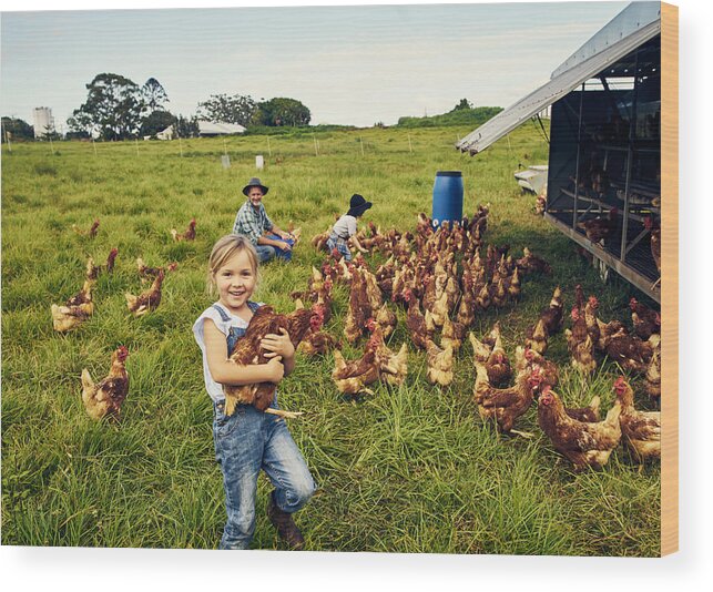 Sibling Wood Print featuring the photograph She loves caring for the chickens by Pixdeluxe