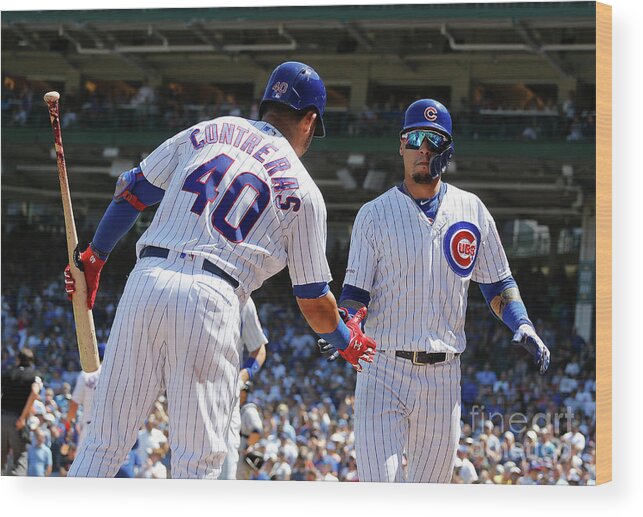 Following Wood Print featuring the photograph Willson Contreras and Javier Baez by Nuccio Dinuzzo Following Wood Print featuring the photograph Willson Contreras and Javier Baez by Nuccio Dinuzzo