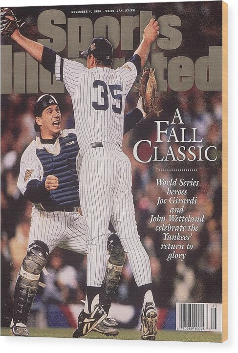 Magazine Cover Wood Print featuring the photograph New York Yankees Joe Girardi And John Wetteland, 1996 World Sports Illustrated Cover by Sports Illustrated
