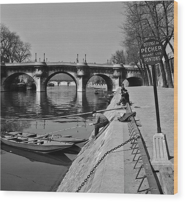 Fisherman Wood Print featuring the photograph Fishing In Paris by Slim Aarons